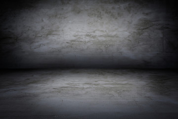Grunge interior room with concrete wall and floor. Empty concrete space.