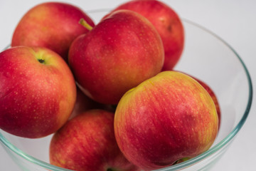 Apples in a glass bowl. 