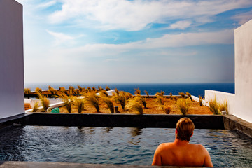 Santorini Man in Pool