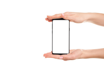 Woman hands holding the black smartphone blank screen with modern frameless design isolated on...
