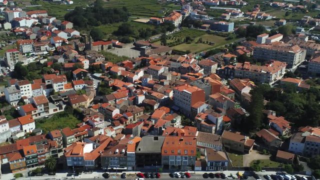 Aerial View on Cambados, Province in Galicia Region, Spain. Coastal Road and Buildings in Small City on Atlantic Ocean Coast