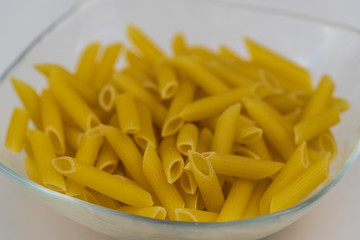 Uncooked organic linguine pasta. 