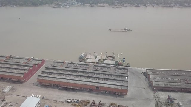 A ship in the harbor along the Yangon river