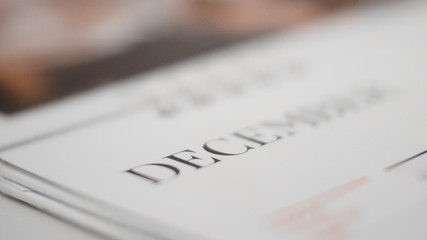 Blurred  month on calendar page.