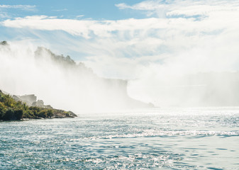 Silhouette of Horseshoe Falls in the mist.