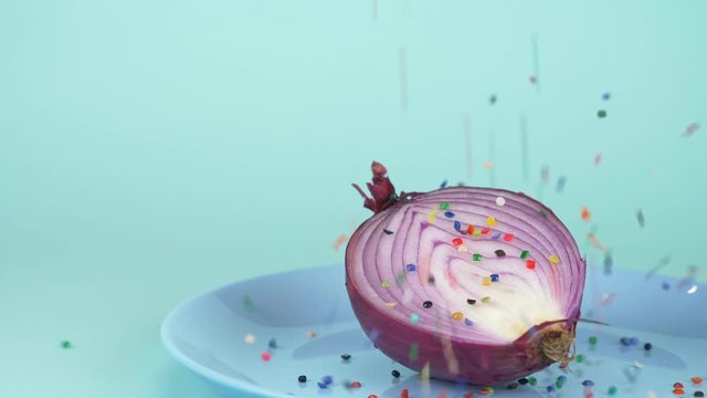  food design. half of the onion is sprinkled with confecti onery sugar sprinkles