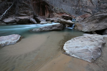 Fototapeta premium Green creek running trough Zion National Park with long exposure
