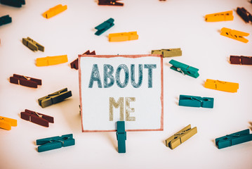 Word writing text About Me. Business photo showcasing telling someone list of your good and bad traits and past events Colored clothespin papers empty reminder white floor background office