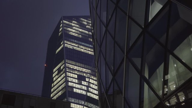 Buildings of the City of London during the night.
