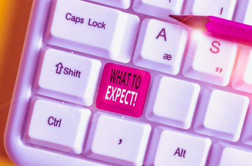 Writing note showing What To Expect. Business concept for asking about regard something as likely to happen occur White pc keyboard with note paper above the white background