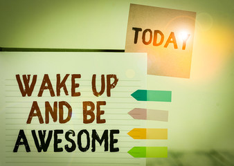 Word writing text Wake Up And Be Awesome. Business photo showcasing Rise up and Shine Start the day Right and Bright Hard cover note book sticky note arrow banners inserted clear background