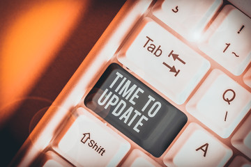 Conceptual hand writing showing Time To Update. Concept meaning The latest information about a...