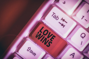 Writing note showing Love Wins. Business concept for used to celebrate or commemorate the victory...