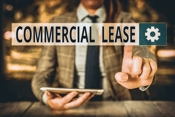 Conceptual hand writing showing Commercial Lease. Concept meaning contract between a landlord and a...