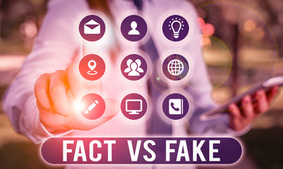 Text sign showing Fact Vs Fake. Business photo showcasing Rivalry or products or information...