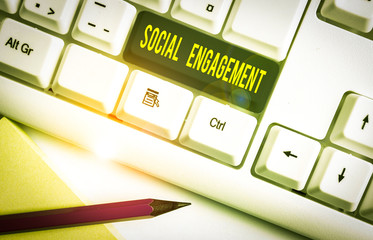 Conceptual hand writing showing Social Engagement. Concept meaning one s is degree of participation...