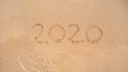 The inscription on the sand 2020 New Year!.
