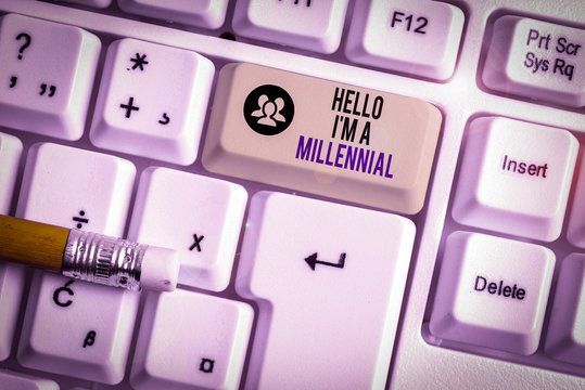 Conceptual hand writing showing Hello I M A Millennial. Concept meaning demonstrating reaching young adulthood in current century White pc keyboard with note paper above the white background
