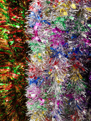 Multi-colored tinsel in the store as a background