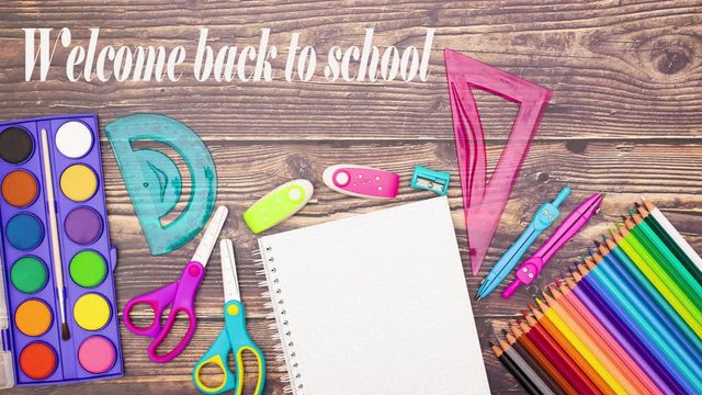 Welcome back to school title appear under school supplies - Stop motion 