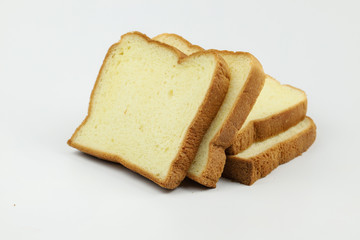 Sliced of yellow bread on white background