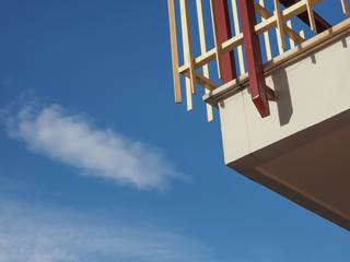 balcony over blue sky with clouds background