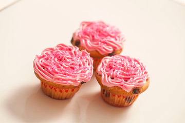 Cupcakes decorated with cream and sugar