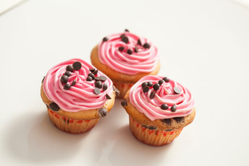 Cupcakes decorated with cream and sugar