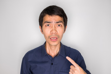 a business man in disappointed emotion is complaining