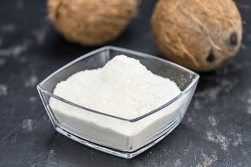 Portion of Coconut flour as detailed close-up shot; selective focus