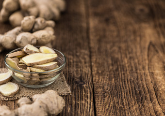 Portion of fresh Ginger (selective focus; close-up shot)