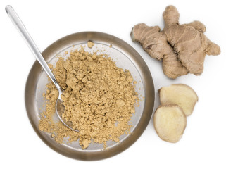 Some Powdered Ginger isolated on white (selective focus)
