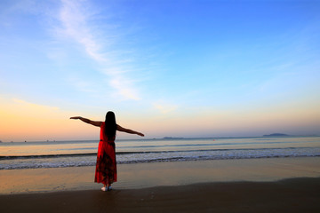 Fototapeta na wymiar A woman by the sea, in southern China