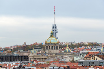 Cityscape of Prague with National museum and Television tower on a cloudy day in autumn