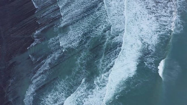 Zumaia and Deba flysch geological strata layers drone aerial view, Basque Country