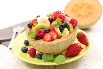 fresh fruit salad in melon bowl