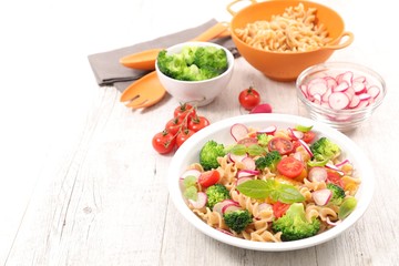 pasta salad with broccoli, radish and basil