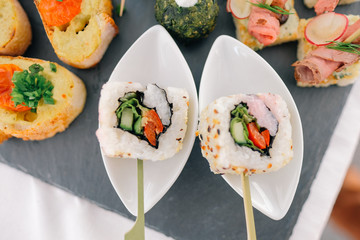 Canape close up. Preparing and serving canapes at the event.