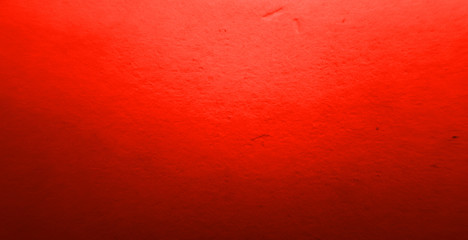 Seamless red blured paper  grunge background texture with space for text or image