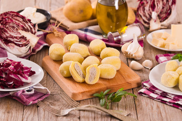 Potato gnocchi stuffed with radicchio and ricotta.	