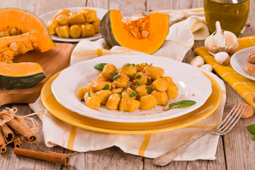 Pumpkin gnocchi with grated amaretti cookies.	