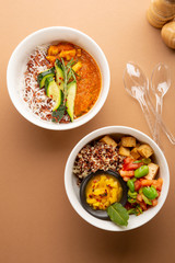 Two bowls with healthy food, top view