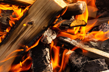 log firewood covered fire bonfire camping background burning design background bright