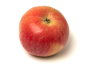 Closeup of the fresh natural apple, isolated on white background.