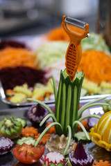 Different raw shredded vegetables and fruits as an example of a healthy diet