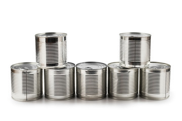 Group of silver canned food on white background.