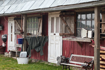 an old Scandinavian rustic red wooden house barrack