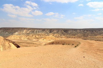 Negev desert mountain panorama with hiking group, Israel