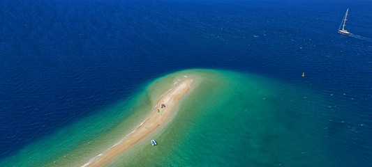 Aerial drone ultra wide photo of tropical exotic turquoise sand bar in exotic bay