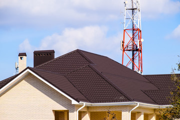 Decorative metal on the roof of the house.
